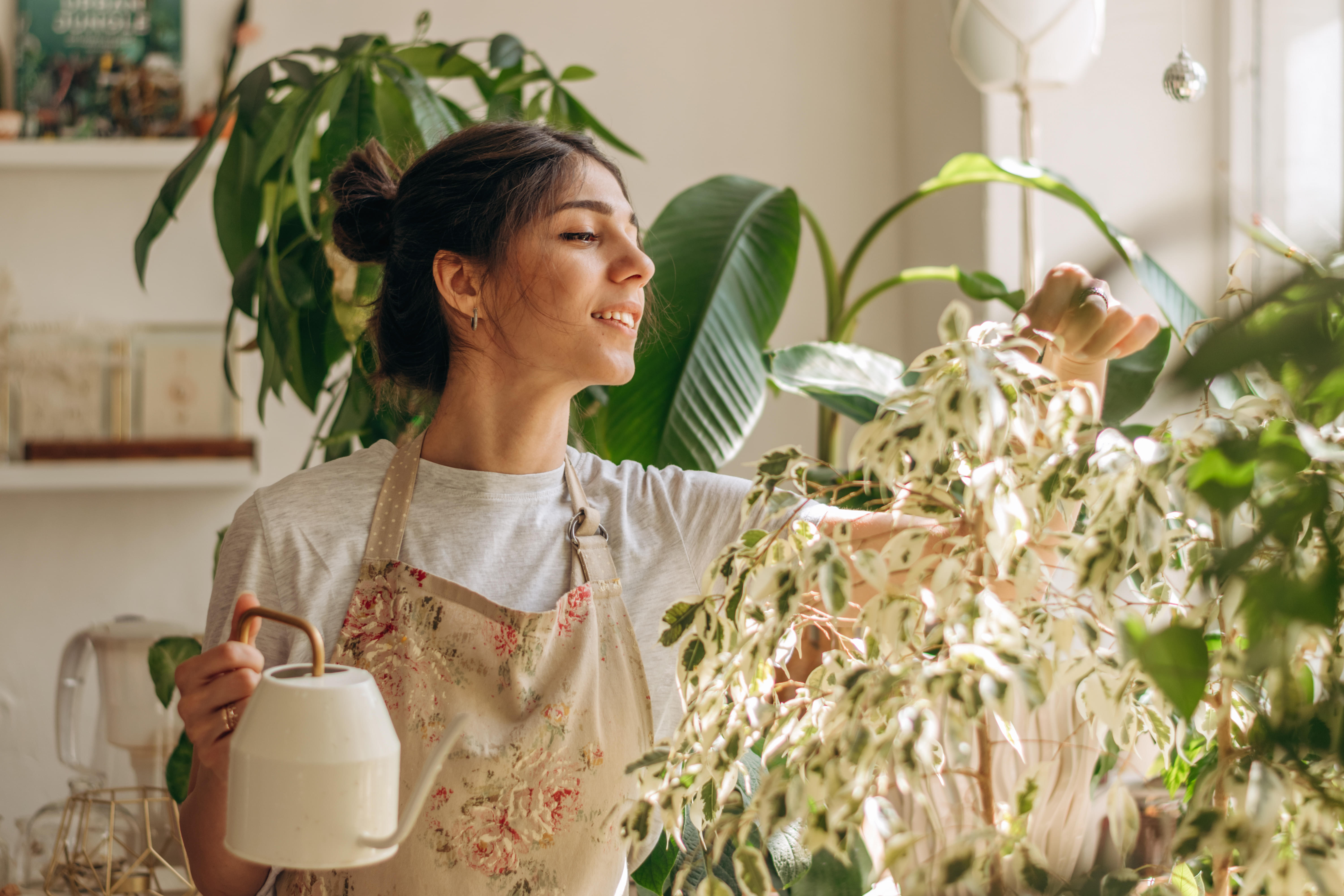 How Often Should I Water My Plants 2023   Happy Plant Owner Watering Can 